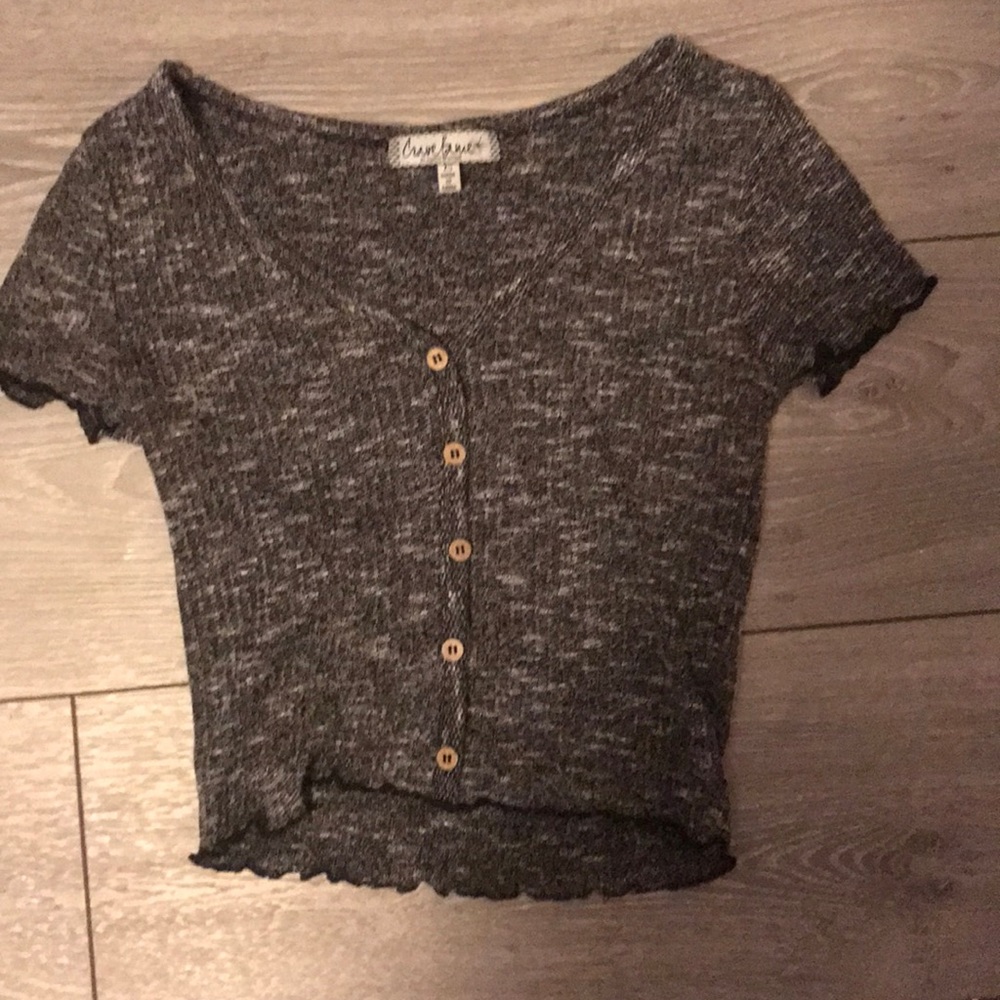 A very cute fitting top, worn once
